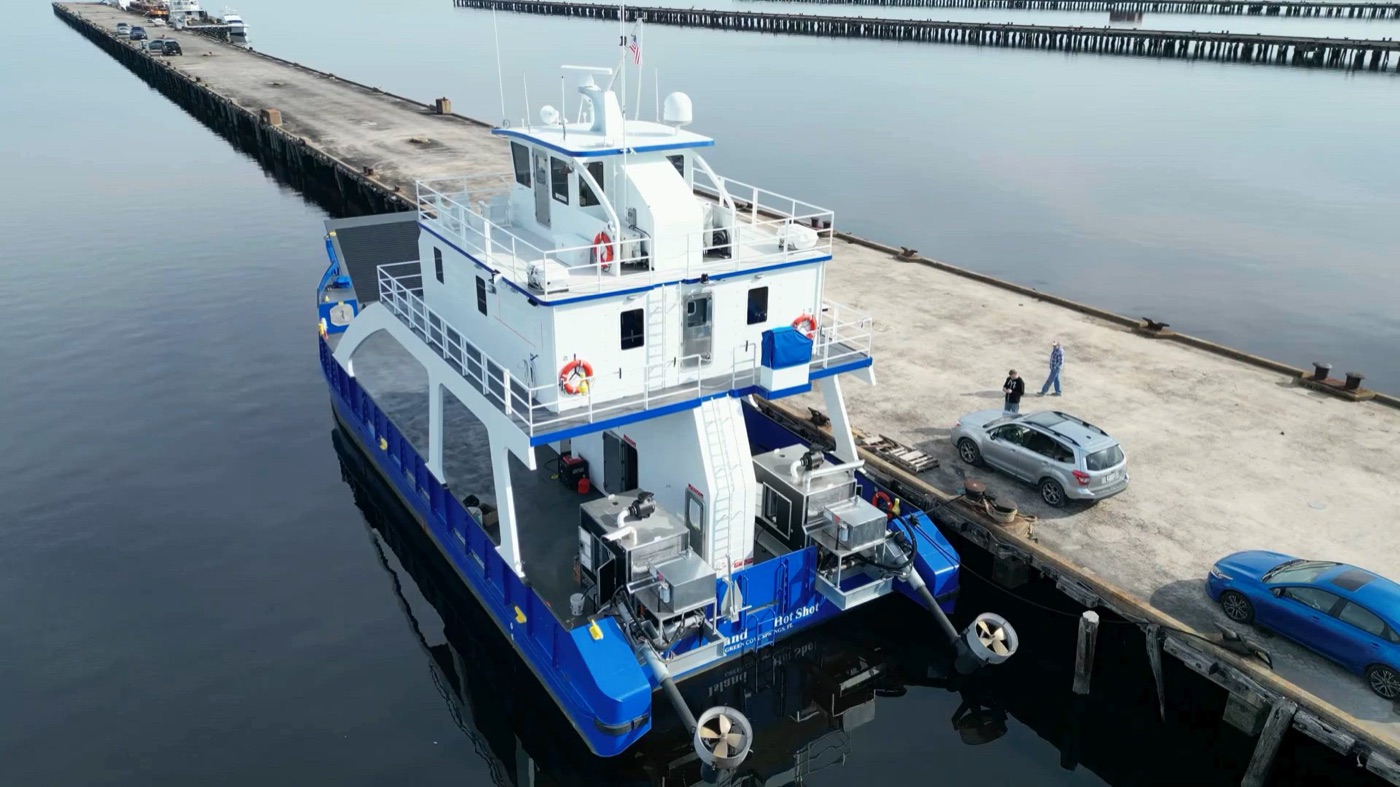 Aerial view of the Island Hot Shot moored at a concrete dock